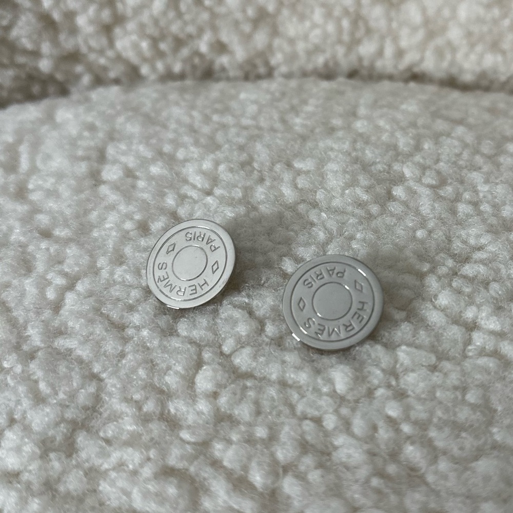 Hermes earrings clip on